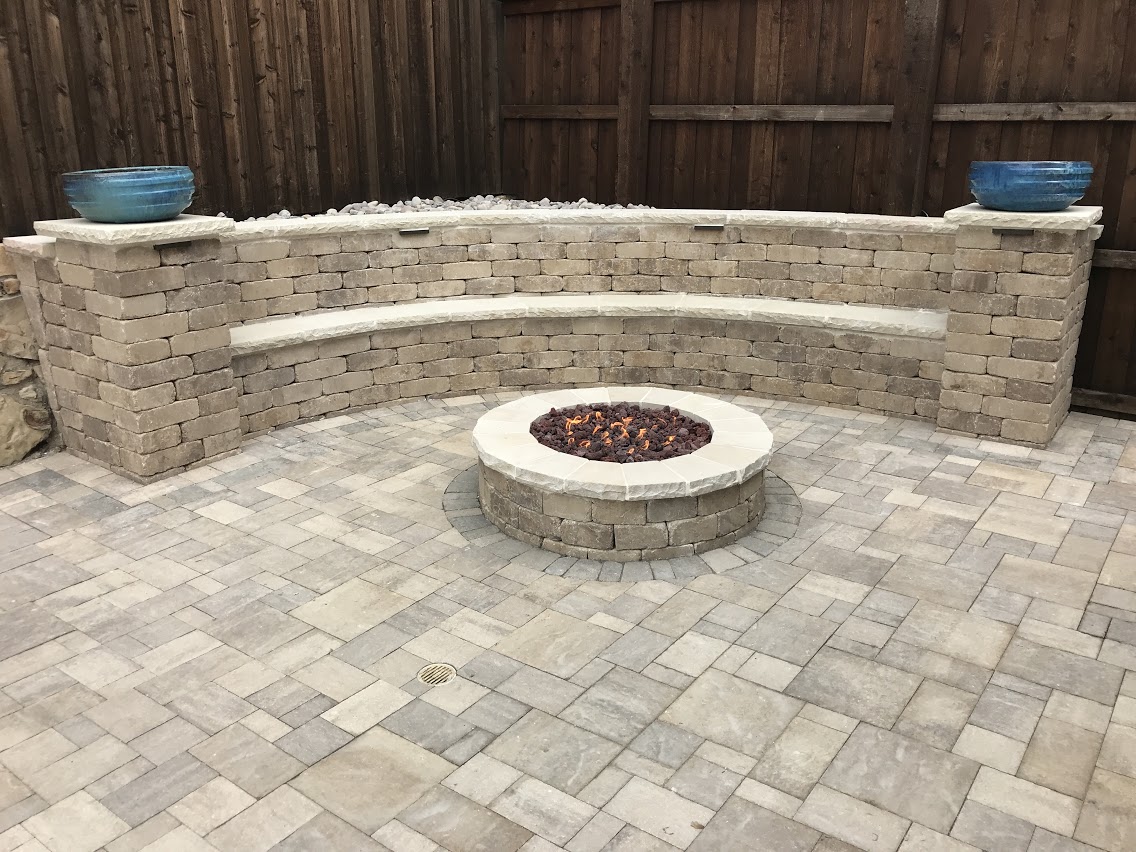 Built in Firepit in dallas texas with bench around the back