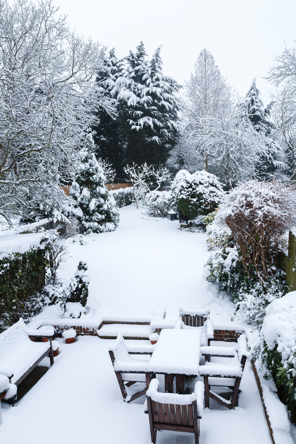 Patio covered with snow in the winter.